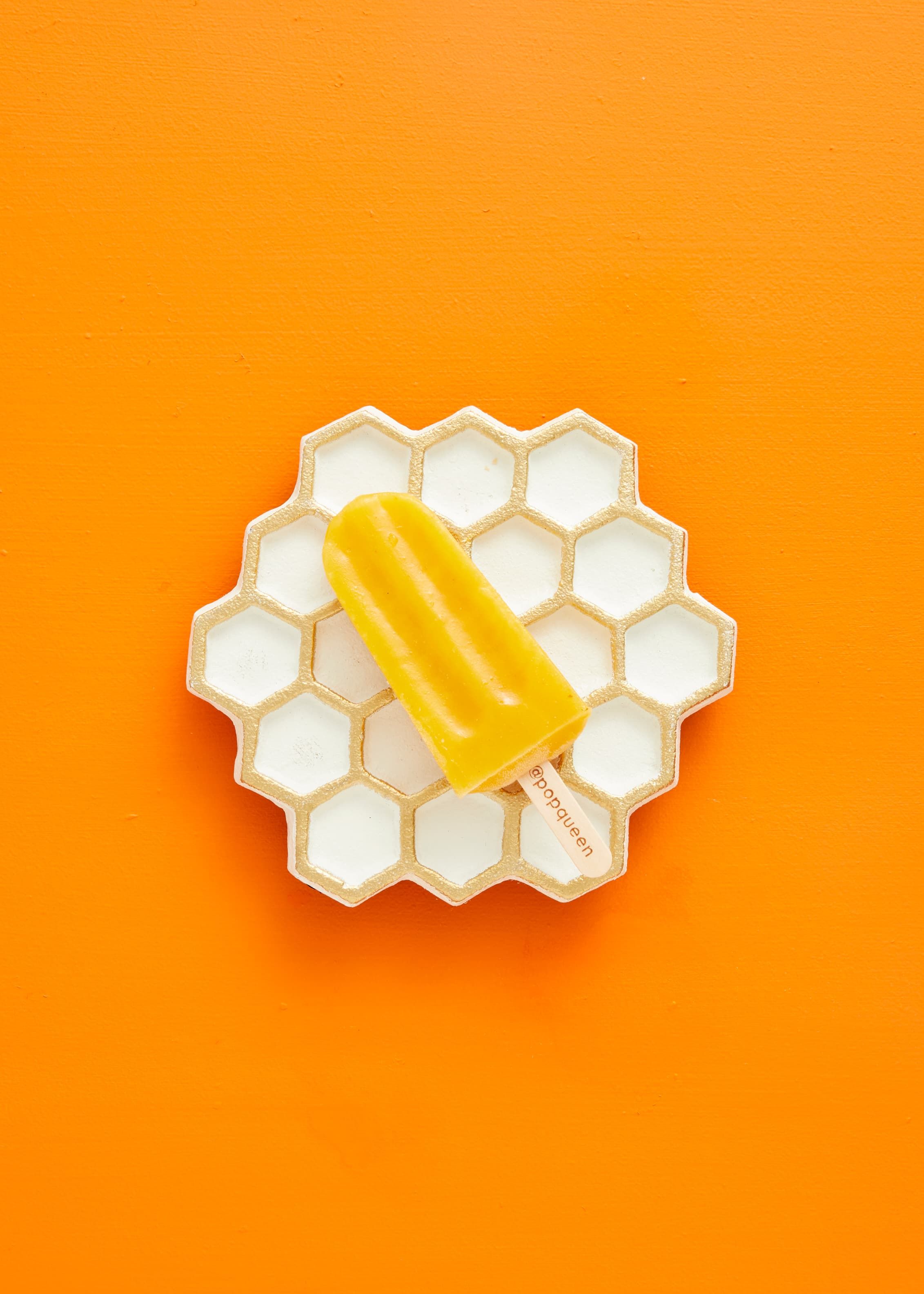 Pop Queen mango honey ice pop with honeycomb